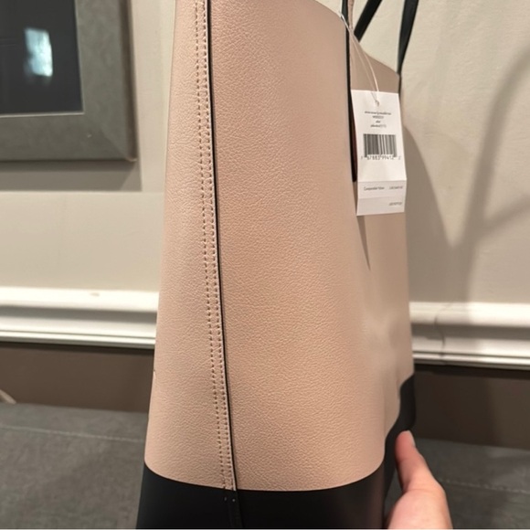 Kate Spade Pink and Black Minnie Mouse Tote
Retail Price is 379.00 - Picture 3 of 6